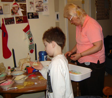 Carole with grandson making cookies