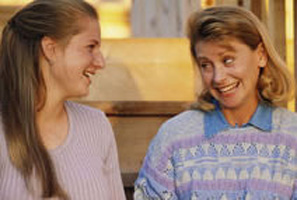 two women happily talking