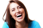 Pretty young woman laughing.