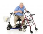 A man transferring from 3-wheeled scooter to walker.