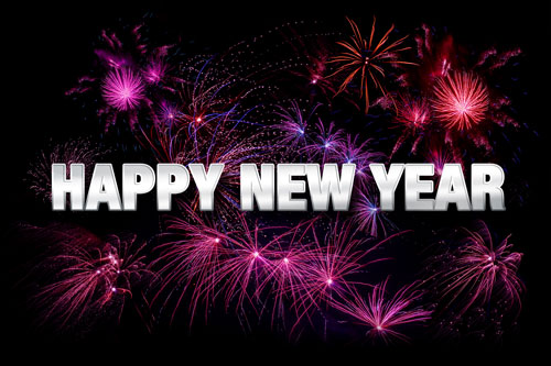 "Happy New Year" in bold, white letters on background of night sky with fireworks.